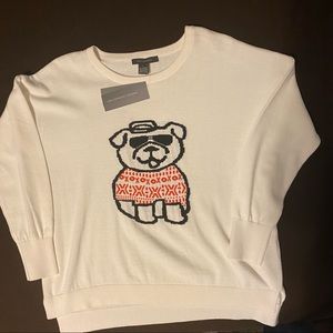 White crew neck sweater.